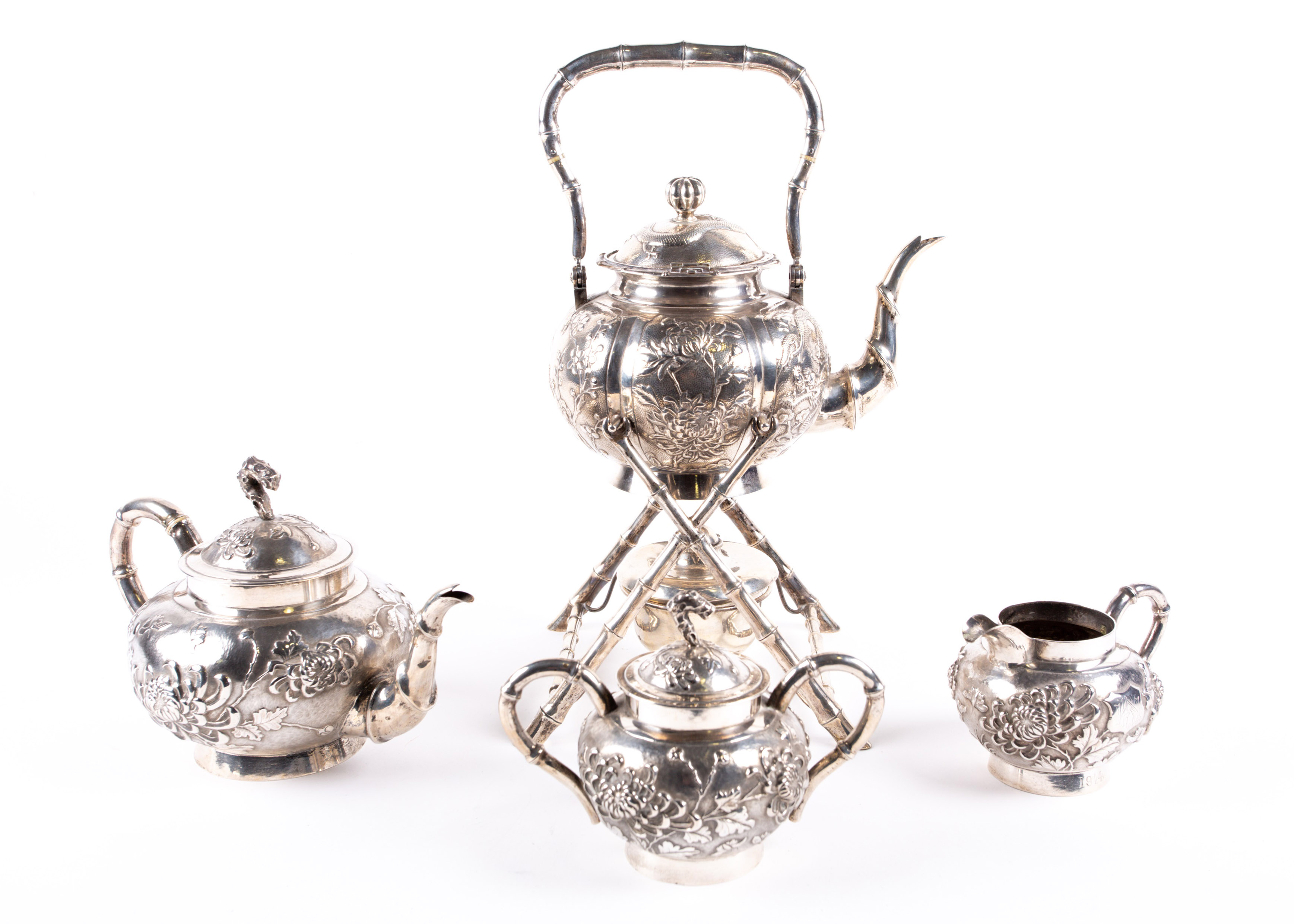 A 19th century Chinese four piece silver tea set by Yok Sang